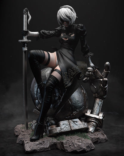 Handpainted NieR Automata resin figure of a blindfolded android woman with sword and broken robot base